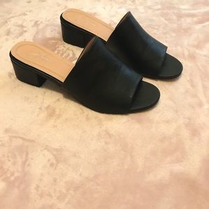J Adams black slip on mules